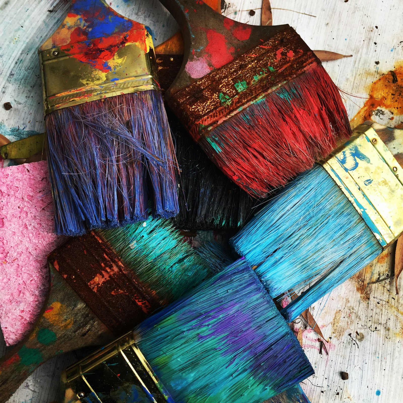 Custom framing workspace with art and materials